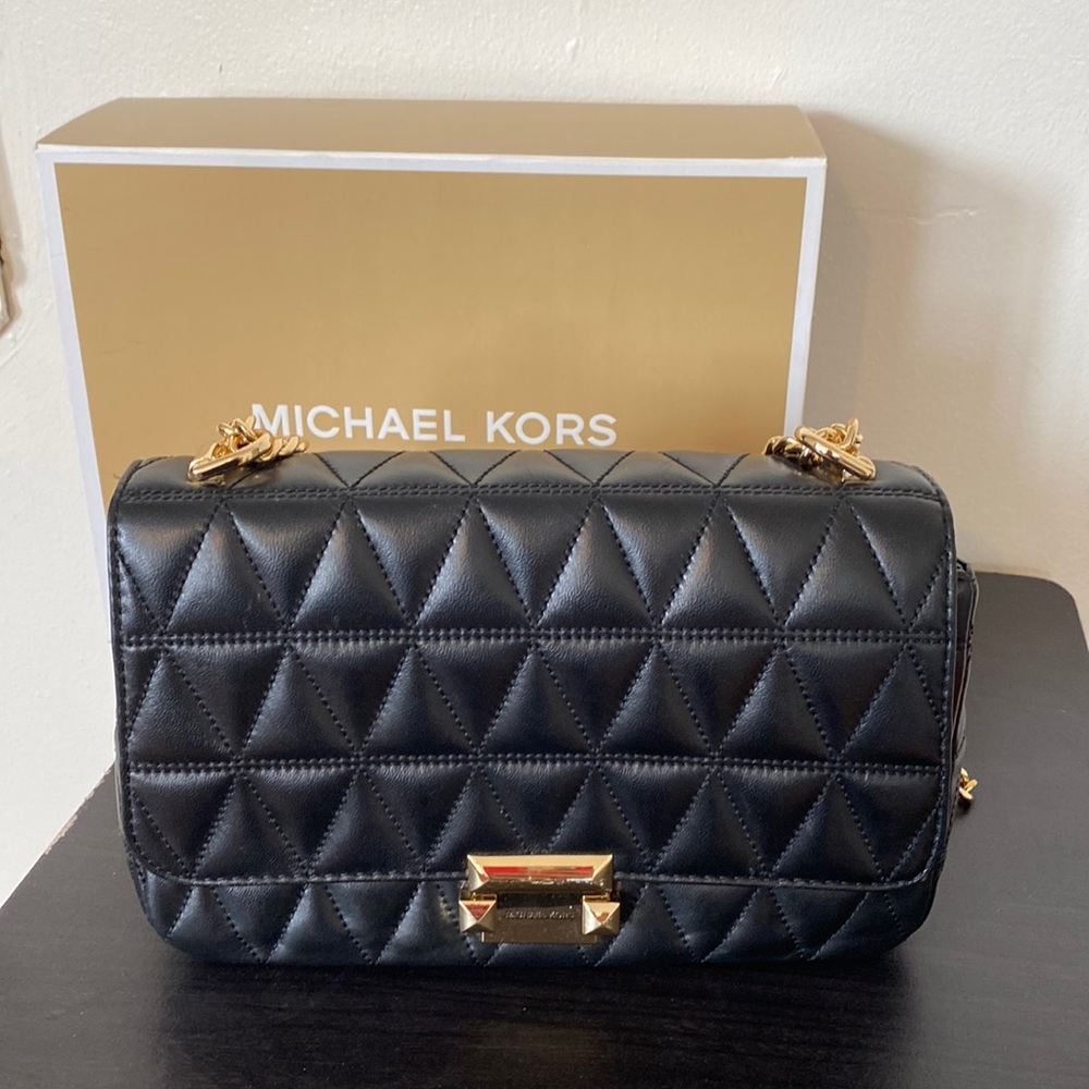 Quilted black Michael Kors crossbody